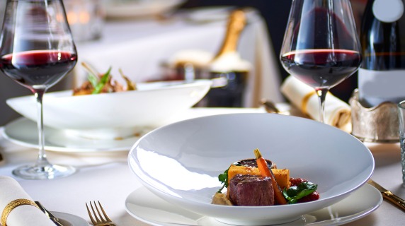 Fancy dining table with wine glasses