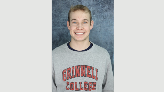 Chris Brown smiles for a headshot