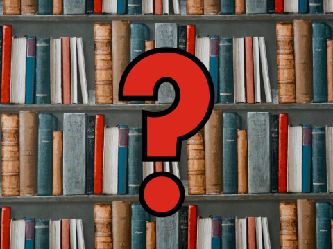 Shelves of books with question mark in the center