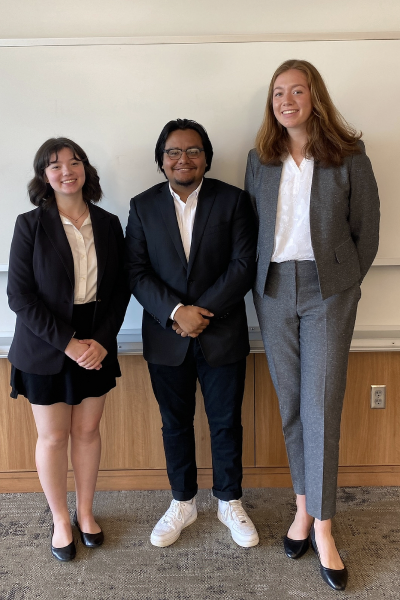 Three professionally dressed young people