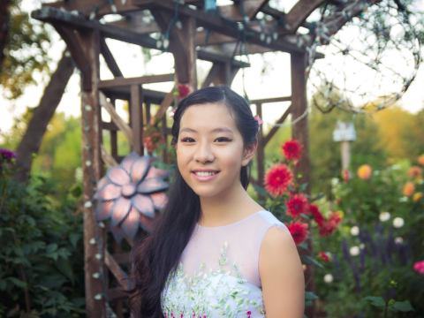 Nhi Vo in a beautiful garden