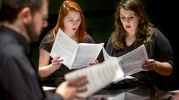 Two singers and a director