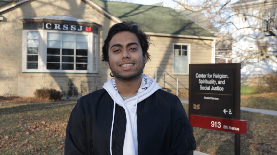 Soham Mukhopadhyay stands in front of the CRSSJ