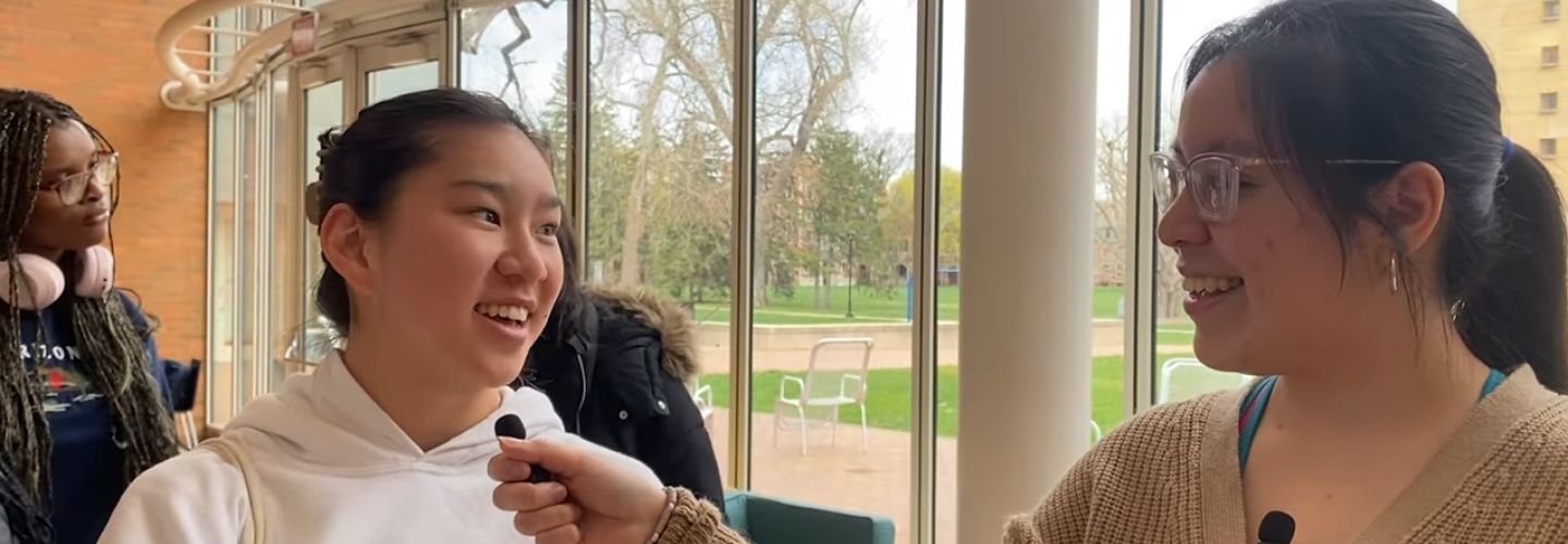 Yesenia Mozo interviews a student in Spencer Grill